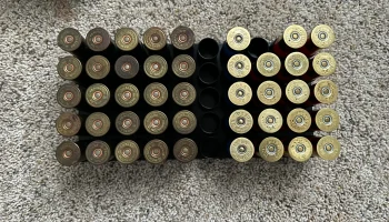 Патроны 12 калибра вмещают 50 патронов....... 2