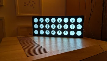 Цифровые часыClock 24 - кинетические часы, состоящие из ...