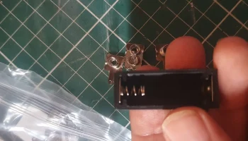 поддержка крышки аккумулятора a23 12v 1