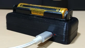 Зарядное устройство для литиевого аккумулятора 18650 USB... 2