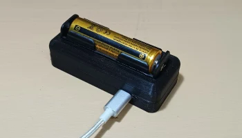 Зарядное устройство для литиевого аккумулятора 18650 USB... 1