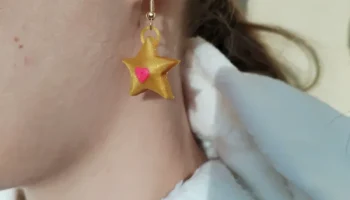 Золотые серьги-звезды с сердцем 1