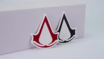 Магнит с логотипом Assassins Creed