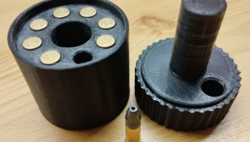 Устройство подачи боеприпасов на 22 л.......