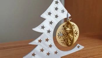 Рождественская безделушка в виде снежинки......
