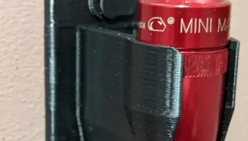 Подставка для фонаря Maglite Mini 2xAAA с магнитом на ст... Подставка для фонаря Maglite Mini 2xAAA с магнитом на ст...