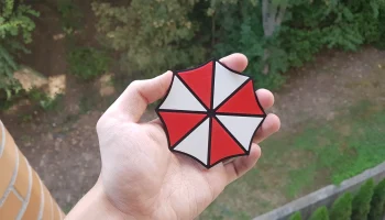 Магнит с логотипом корпорации Umbrella...... 1