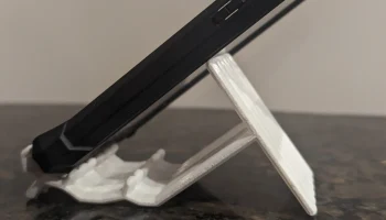 Трехугольная подставка для телефона в режиме вазы... 2