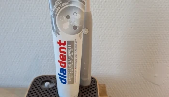 Электрическая зубная щетка Ladestation Oral-B Pulsonic Sl... 1