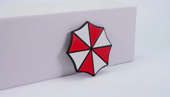 Магнит с логотипом корпорации Umbrella......