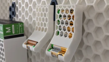 Диспенсер для аккумуляторов для сотовой стены хранения (...