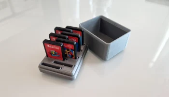 Переключаемый игровой контейнер на 8 игр...