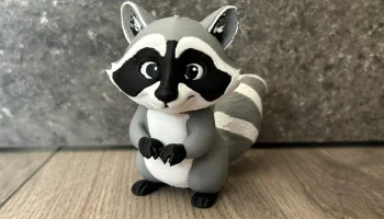 Фигурка енота