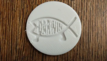 Рыбная монета Дарвина