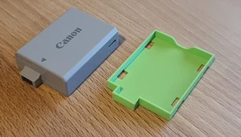 Крышка батарейного отсека Canon LP-E5 2