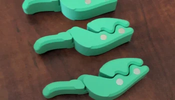 Зажим для сумки Curvy Cam Lock с магнитами......
