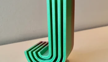Декоративный блок, инициал "J"
