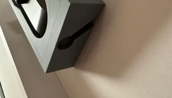Настенное крепление и зарядное устройство для аккумулято... 1