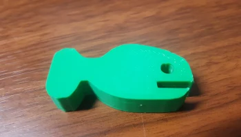 Забавная маленькая игрушечная рыбка... 1