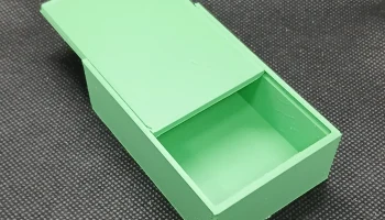 Маленькая коробка с раздвижной крышкой... 1