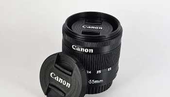 Контейнер для объектива Canon и держатель для ручек......... 1