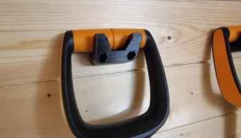Настенное крепление для садовых инструментов Fiskars