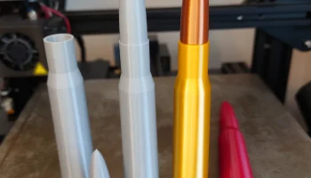 Реплика .50 BMG и защелкивающаяся крышка......
