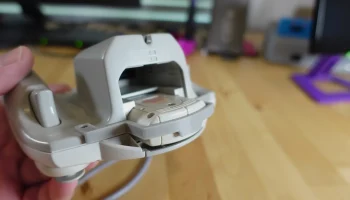 Скоба блокировки Dreamcast VMU Скоба блокировки Dreamcast VMU