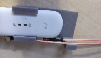 Поддержка антенного кабеля для модема/маршрутизатора ZTE ... 1