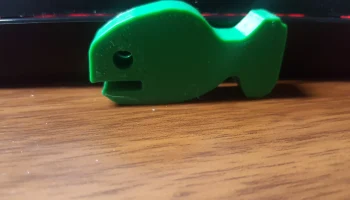 Забавная маленькая игрушечная рыбка... 3