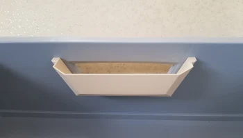 Крышка отверстия для ручки контейнера...