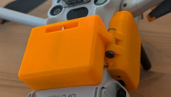 Механизм сброса полезной нагрузки DJI Mini 3 и 4 Pro, уп... Механизм сброса полезной нагрузки DJI Mini 3 и 4 Pro, уп...