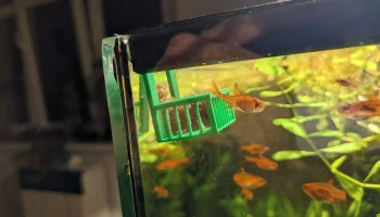 Кормушка для замороженных кормов для рыбы...