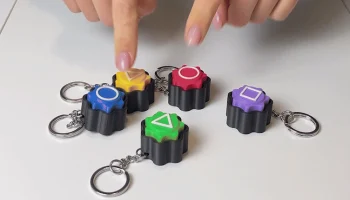 Игрушка для ловли кальмара Gonggi, брелок-кликер... 2