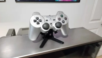 Держатель/подставка для контроллера PS1/PS2/Playstation..... 1