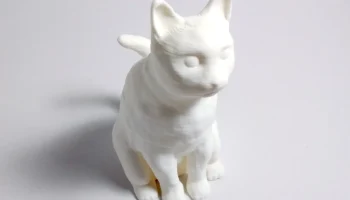 Скульптурная сидячая кошка Скульптурная сидячая кошка