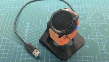 Подставка для зарядного устройства для часов Garmin......... 1