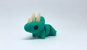 Шарнирная игрушка-динозавр с трицератопсом... 1
