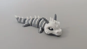 Костяной дракон - шарнирная фигурка-брелок............
