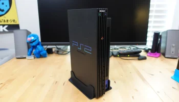Толстая и тонкая вертикальные подставки для PlayStation 2 7