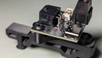 Крепление USB-адаптера Nitehawk-36 для зажима Voron DIN.... 1