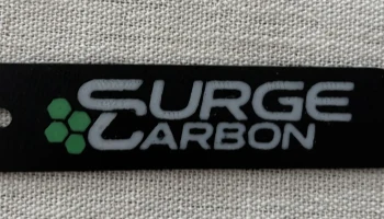 Брелок в стиле Surge Carbon для электронного велосипеда...