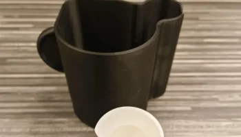 Drž&aacute;k ml&eacute;kovače s odkap&aacute;vačem - Delonghi Magnifica Evo (V... 8