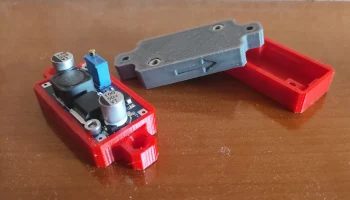 Крепление понижающего преобразователя............ 2