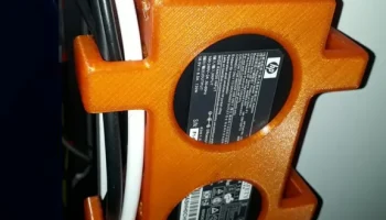 Блок питания под настольным держателем для портативного к... 3