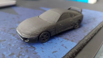 Toyota Supra с принтом на месте, подвижные колеса........... 1
