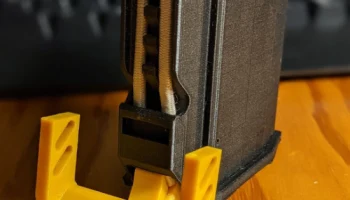 Рычаг фиксатора адаптера магазина Nerf Wildcard 2 Calibur... Рычаг фиксатора адаптера магазина Nerf Wildcard 2 Calibur...