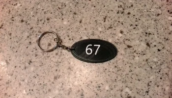 67 Брелок