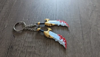 Брелки Blades of Chaos разноцветные - God of War.........