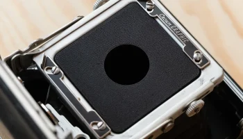 Линзовая плата для 'Baby' Graflex 2x3, отверстие Compur 0... 1